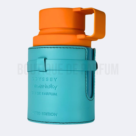 Teal container with orange lid featuring 'Odyssey' branding on a light gray background