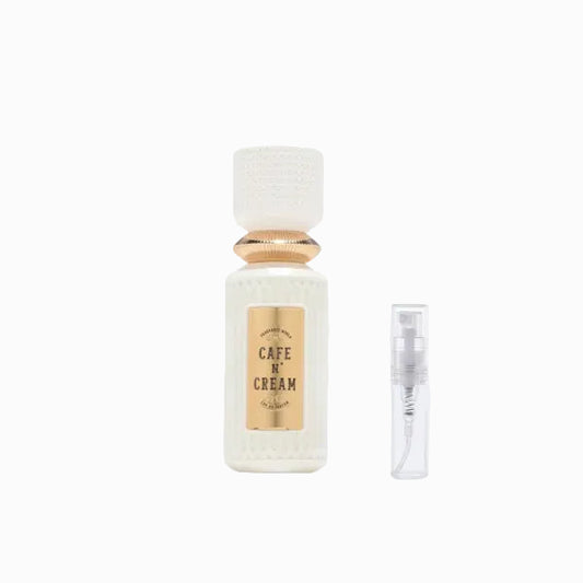 Perfume bottle labeled 'Cafe N Cream' on a white background