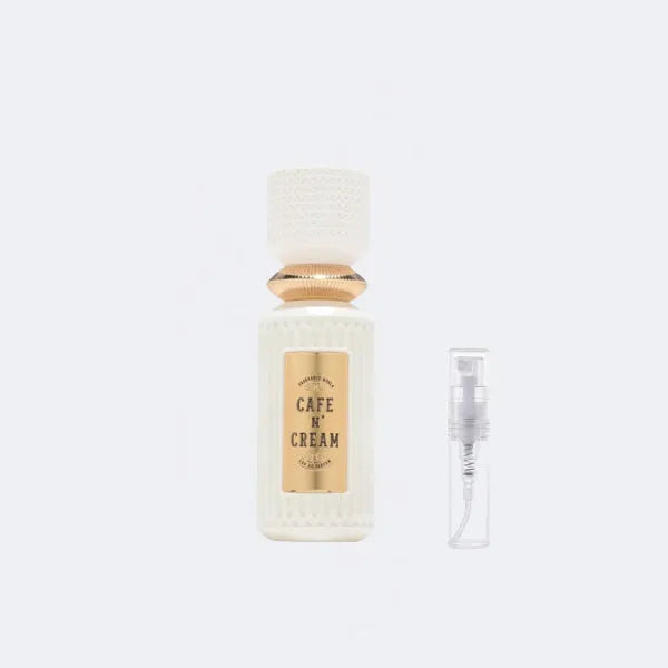 Perfume bottle labeled 'Cafe N Cream' on a white background